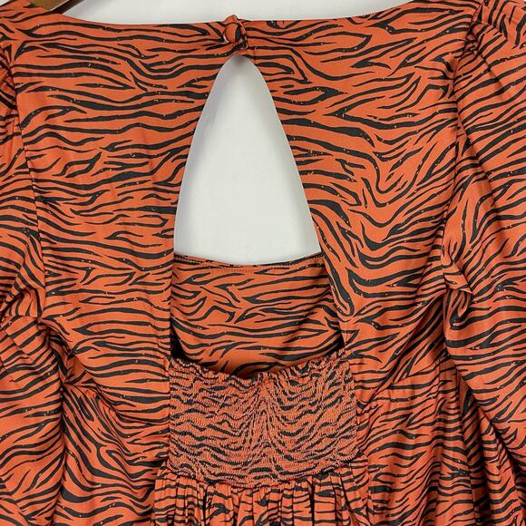 Free People | Tiger Open Back Cut-Out Flouncy Peplum Smocked Long Sleeve Top - Picture 6 of 11